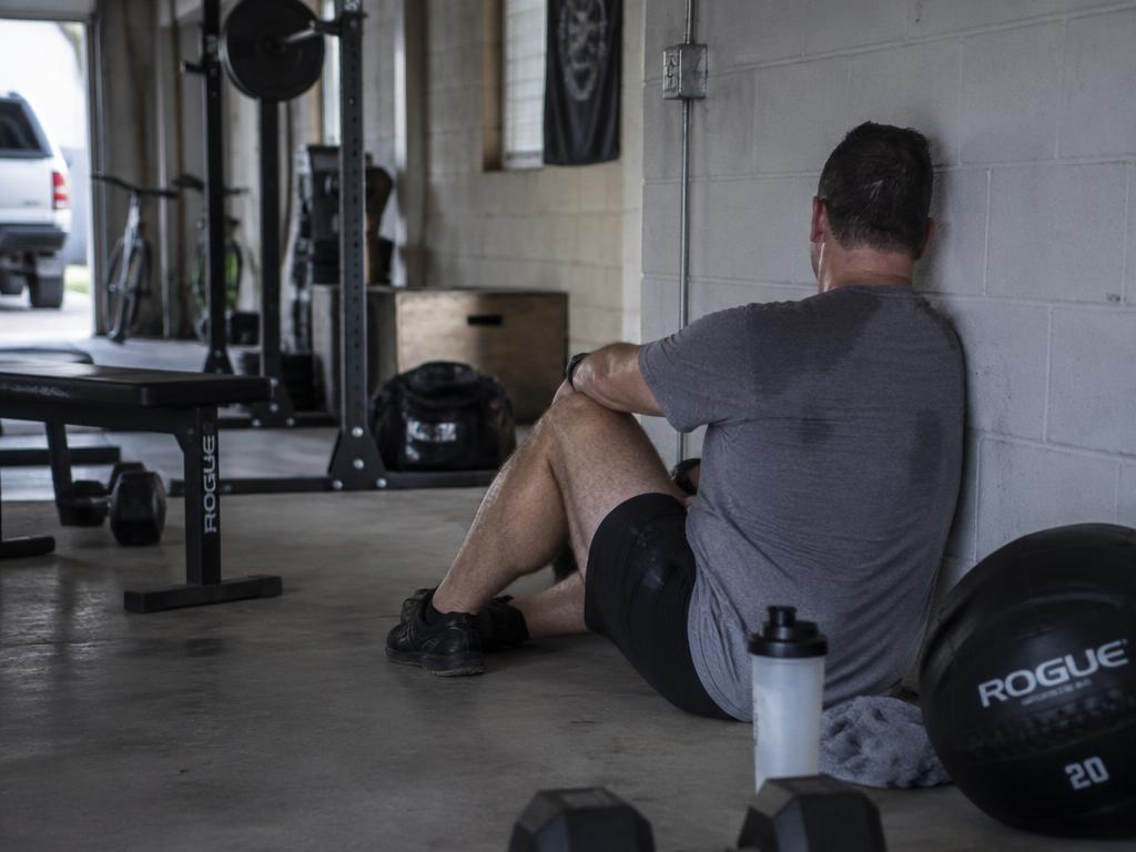 Adult in athletic wear beside a pool deck after training in South Florida