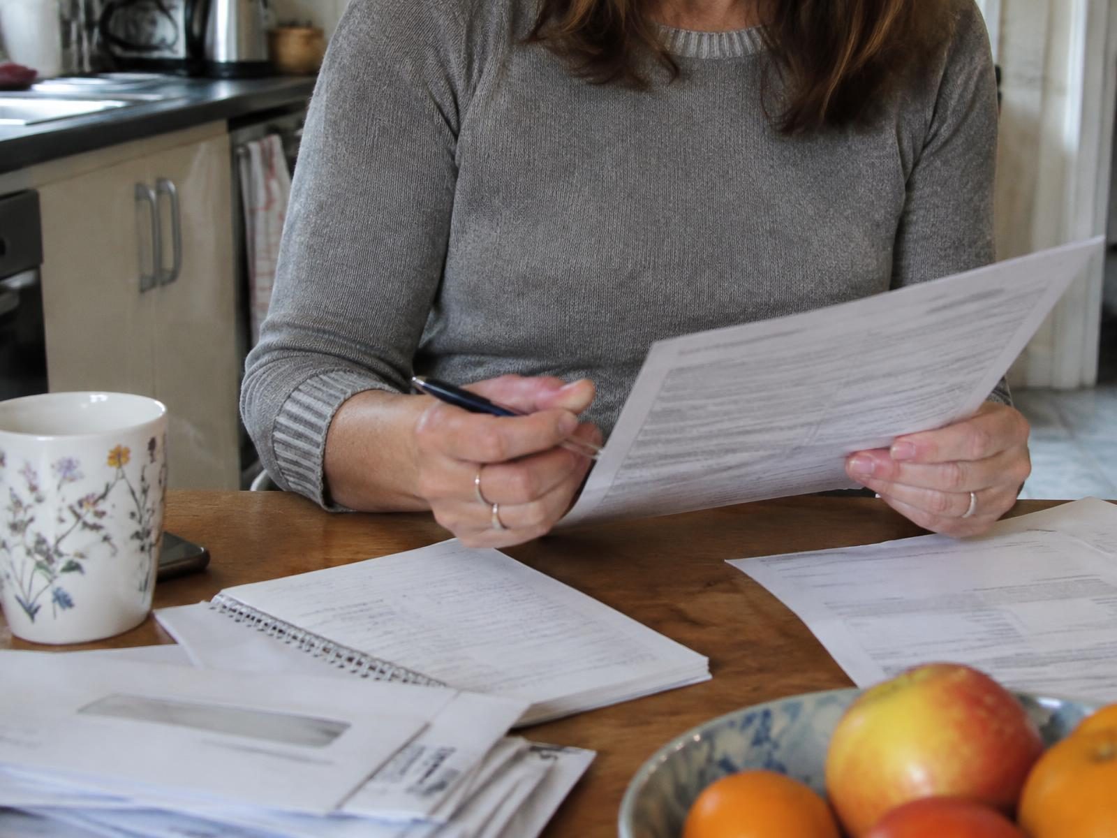 Adult smiling during a private online appointment in a bright Fort Lauderdale home